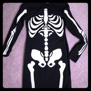 Skeleton body on dress.